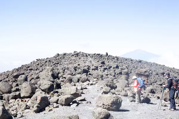 Trekkers hiking during 7 days Lemosho route Kilimanjaro climbing tour